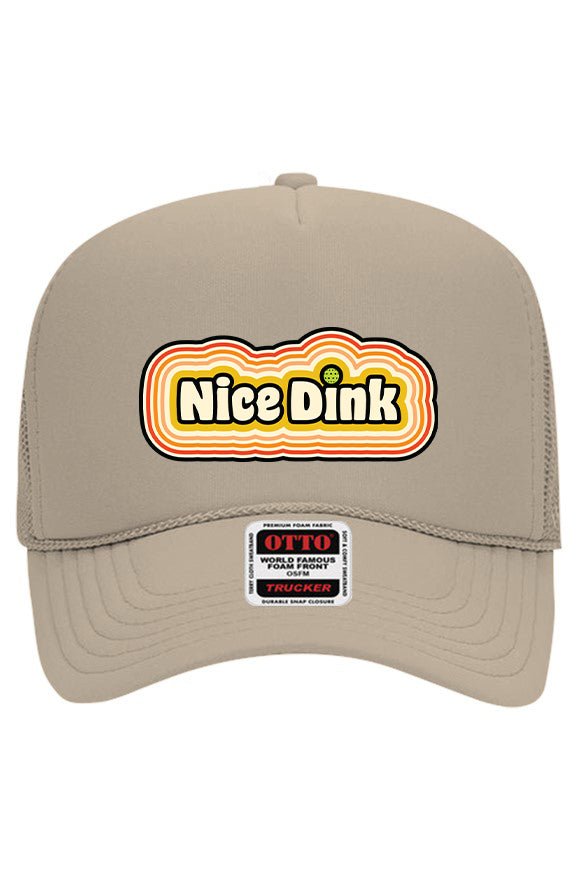 Khaki Volleybird trucker hat with mesh back and retro-style 'Nice Dink' patch in orange, yellow, and black on the front