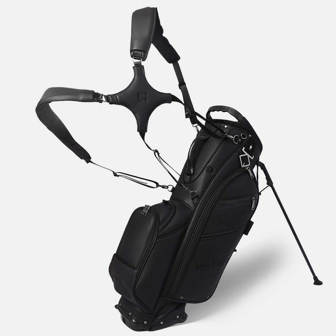 Black golf bag with stand on a white background