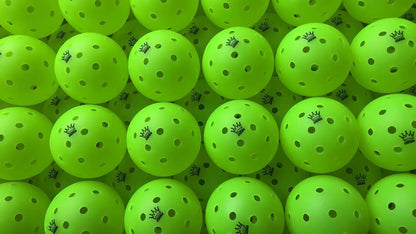 Multiple green pickleballs with a brand logo on a green background