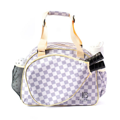 Checkered pickleball bag with paddle and balls on a white background