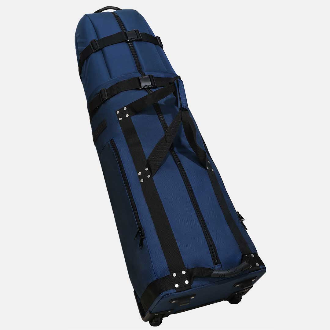 Blue rolling suitcase with black straps on a white background