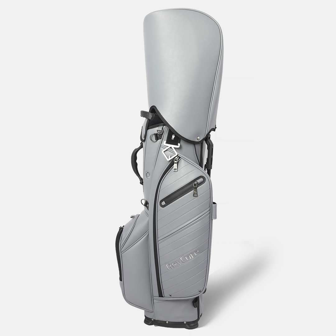 Gray golf bag with a club on a white background