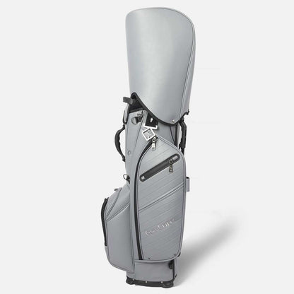 Gray golf bag with a club on a white background