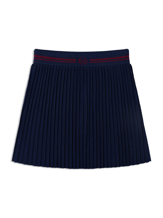 Navy pleated tennis skirt with red waistband on a white background