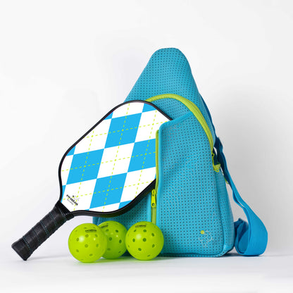 Blue pickleball bag with paddle and balls on a white background