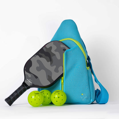 Blue pickleball bag with a paddle and balls on a white background