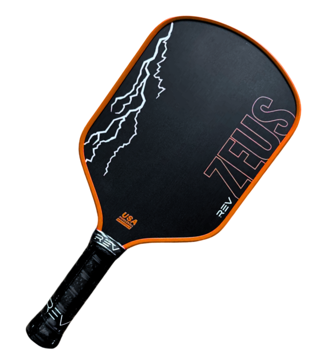 Pickleball paddle with black and orange design on a white background