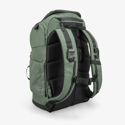 Green and black backpack on a white background