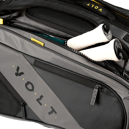 Gray Volt suitcase with a white shoe inside, featuring the Volt logo.