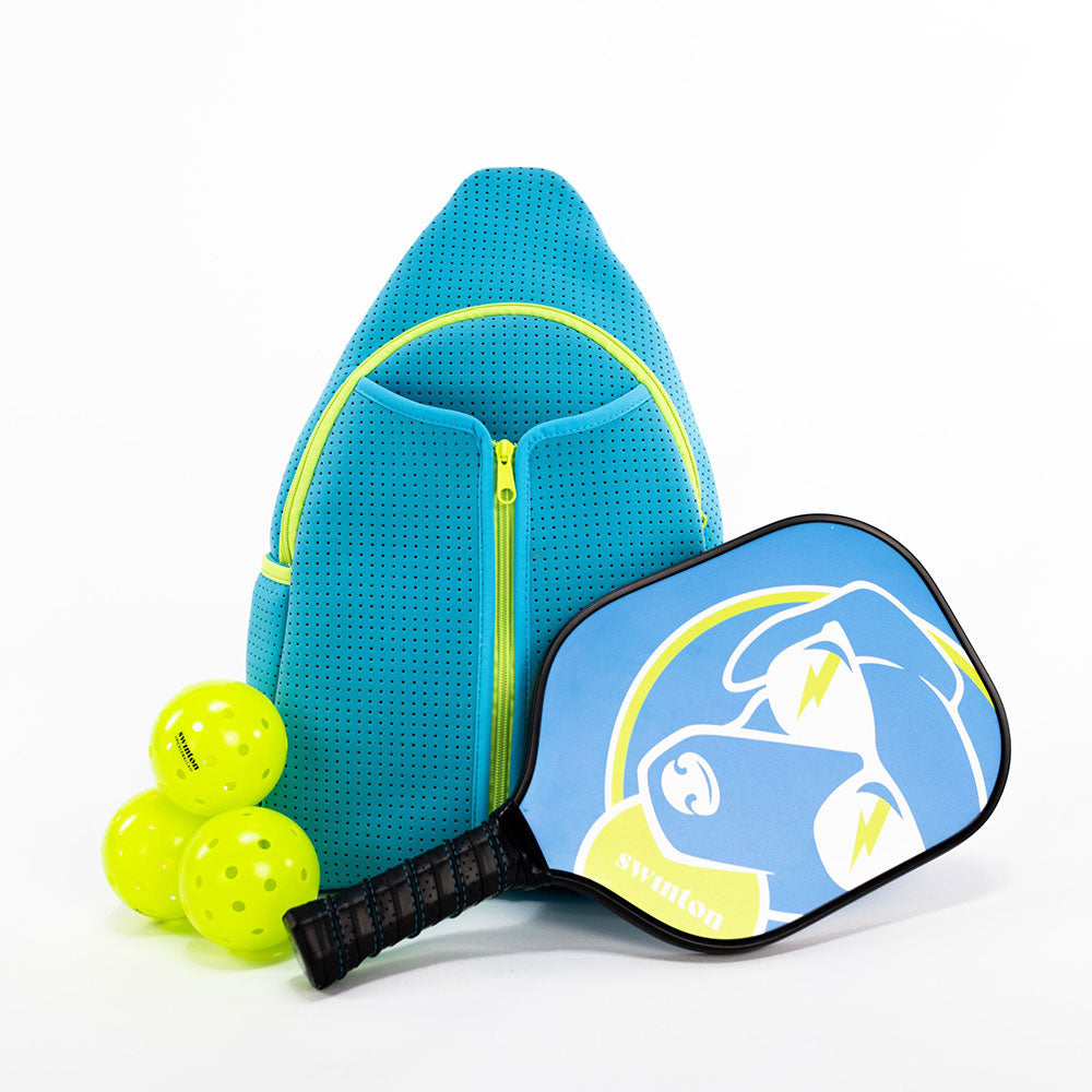 Blue pickleball bag with a paddle and three balls on a white background