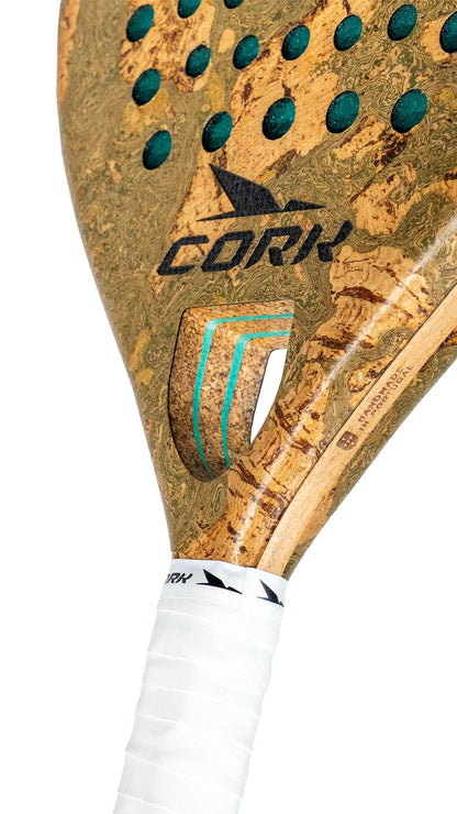 Close up of handle of Cork padel racket with cork texture and white handle on a white background