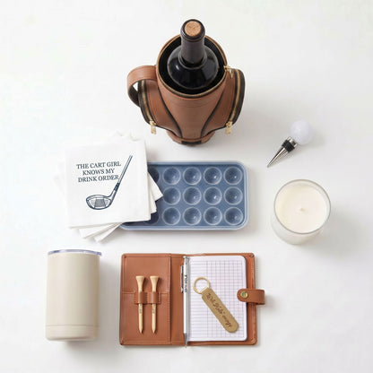Golf lifestyle pieces: candle and drinkware from the VolleyBird box