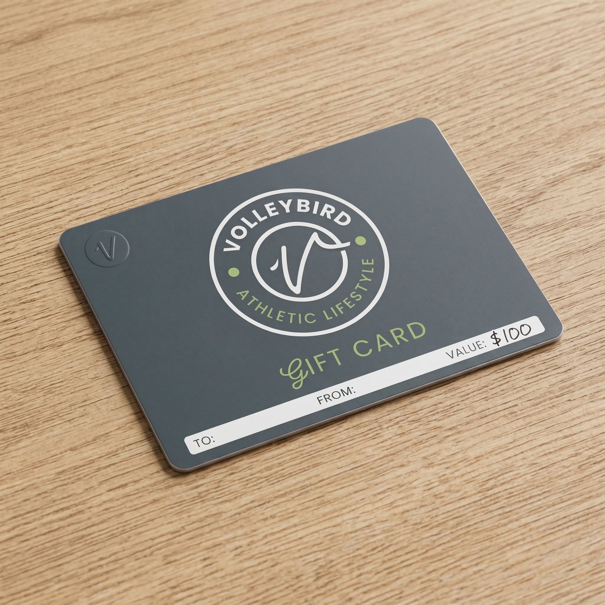 card sitting on wooden table top