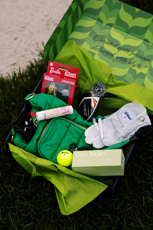 box of golf items