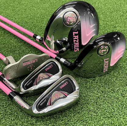 Golf clubs with pink and black design on a green grass background