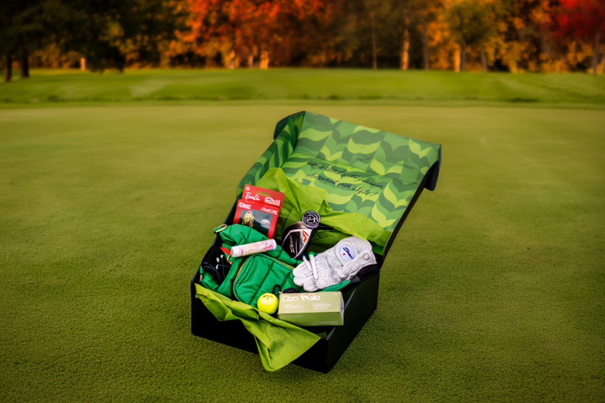 Golf subscription gift box unboxing outdoors