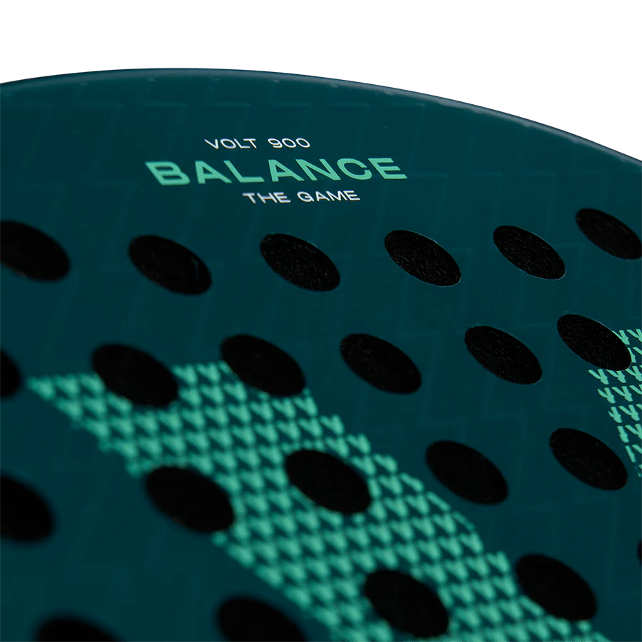 Close-up of a green and black sports pad with 'Balance The Game' branding.