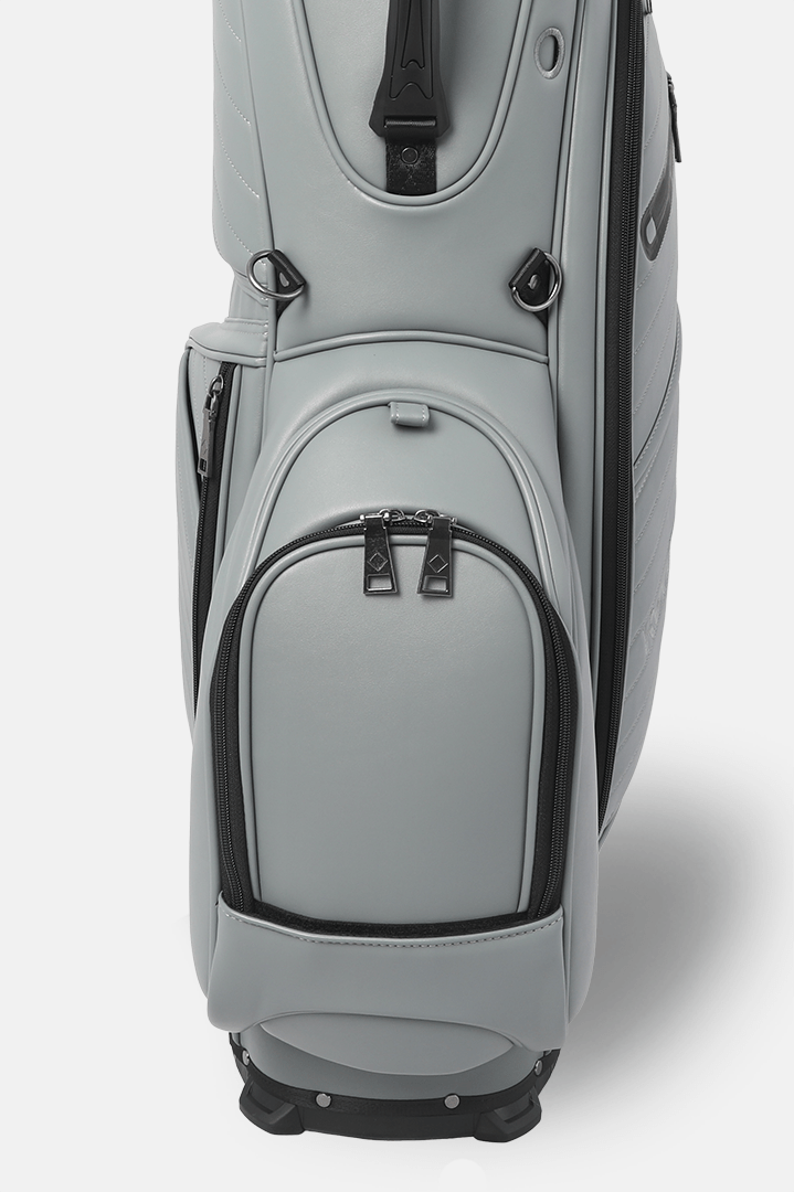 Gray golf bag with black accents on a white background