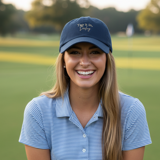 girl wearing golf cap navy